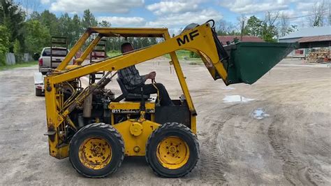 MF 811 Skid Steer 